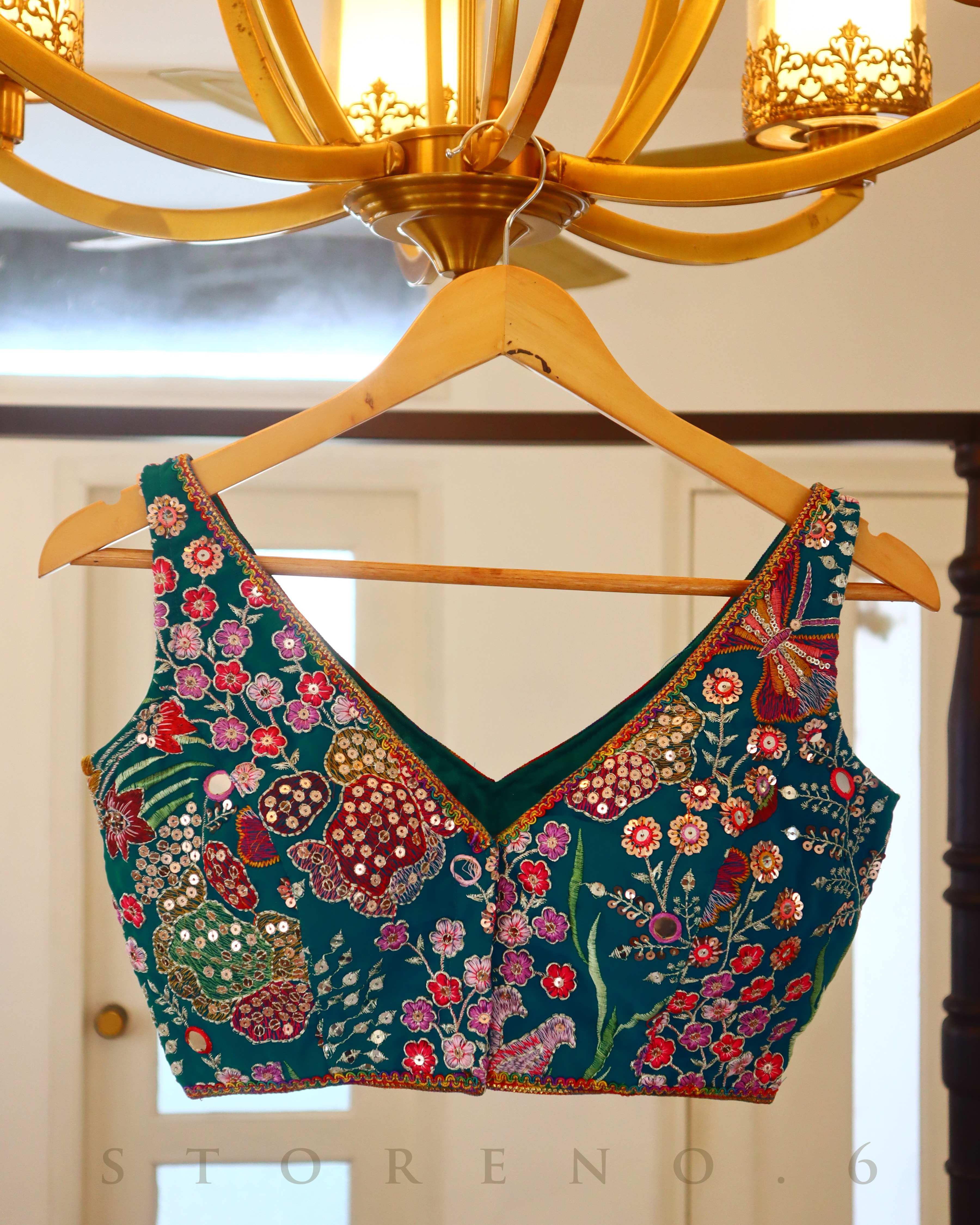 AUGUST ADVENTURE SAREE AND TROPICAL TEAL SLEEVELESS BLOUSE