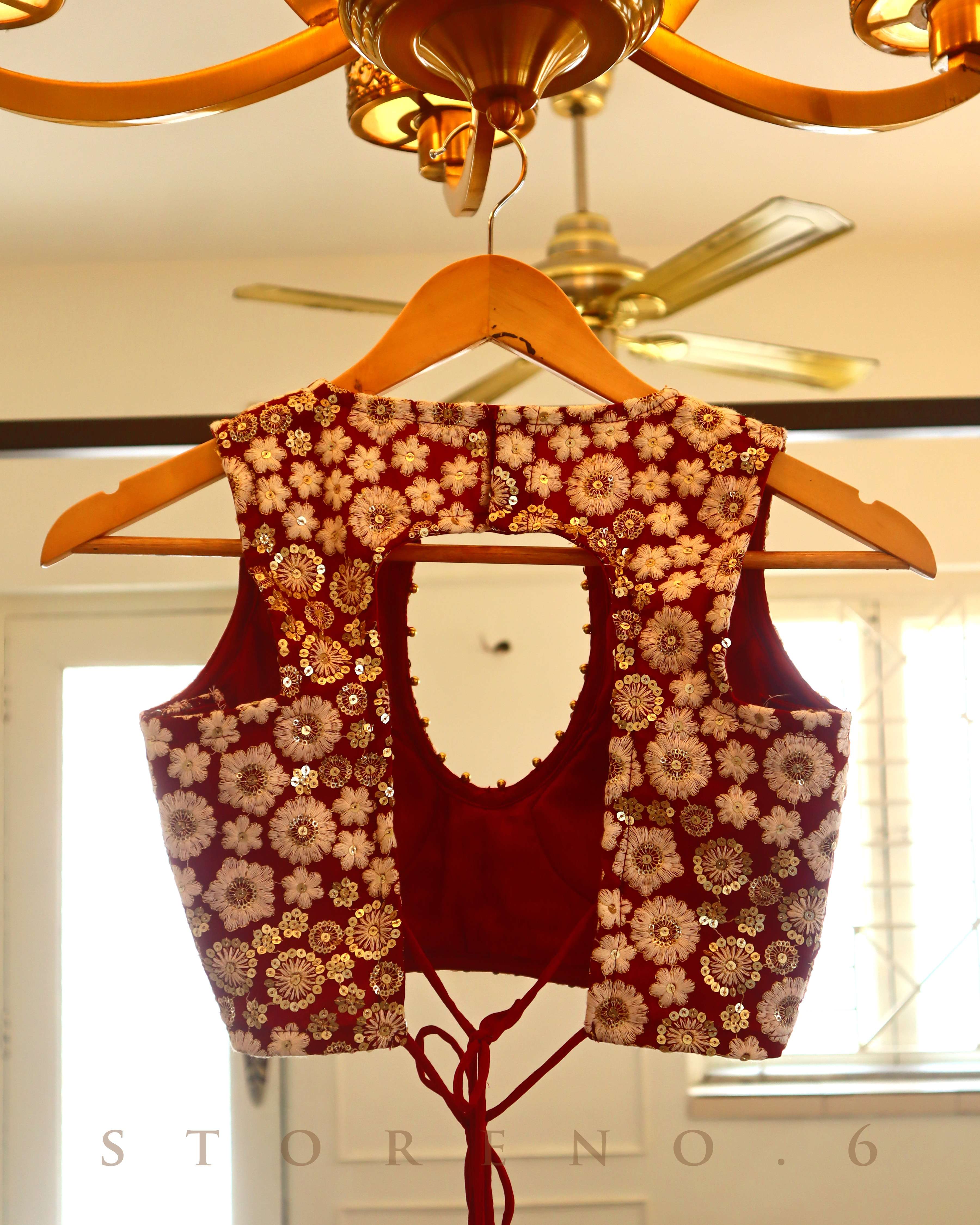 NARGIS-E-SURKH RETRO SLEVELESS BLOUSE