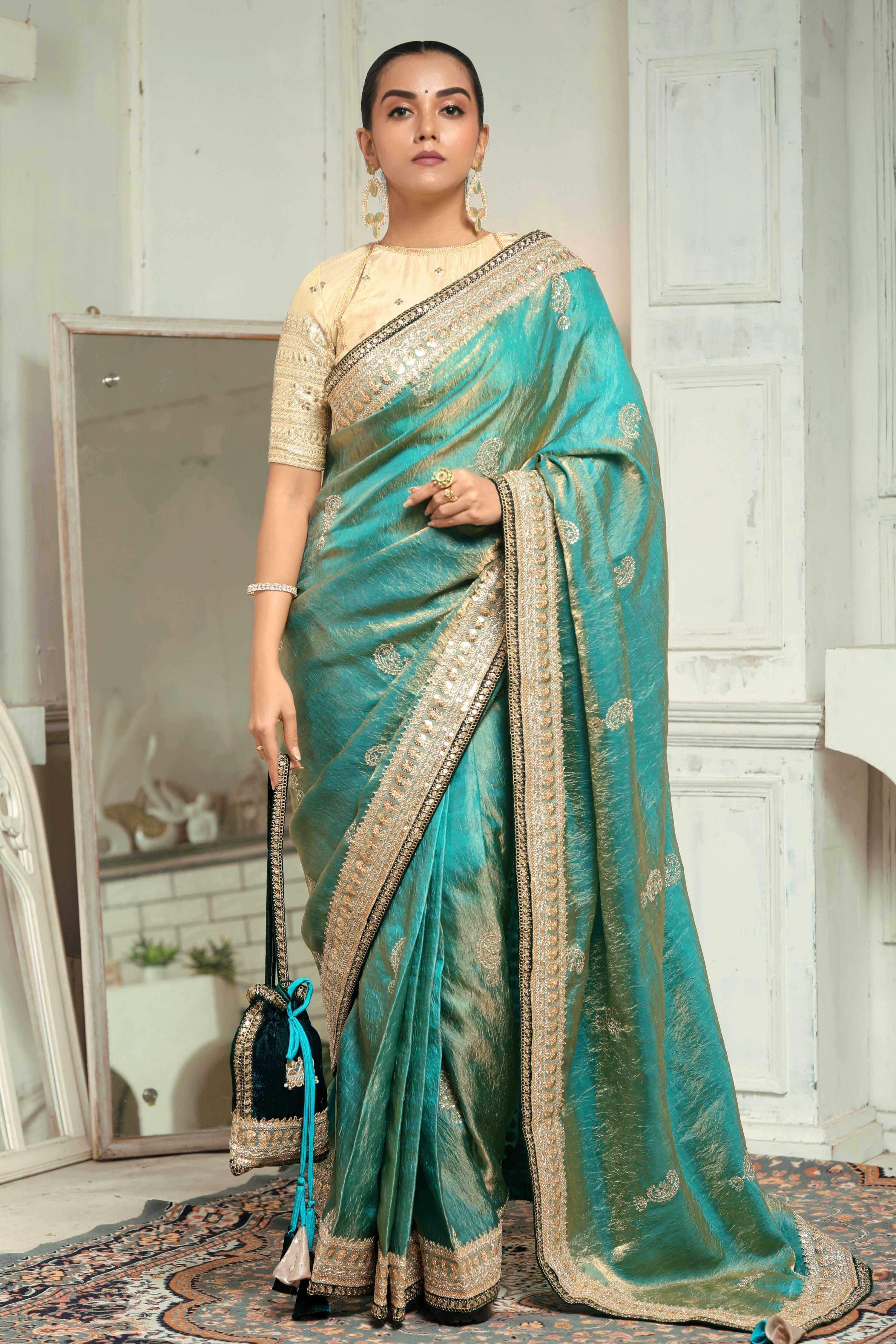 AQUA AMOUR SAREE WITH THE CLASSIC CHAMPAGNE BLOUSE