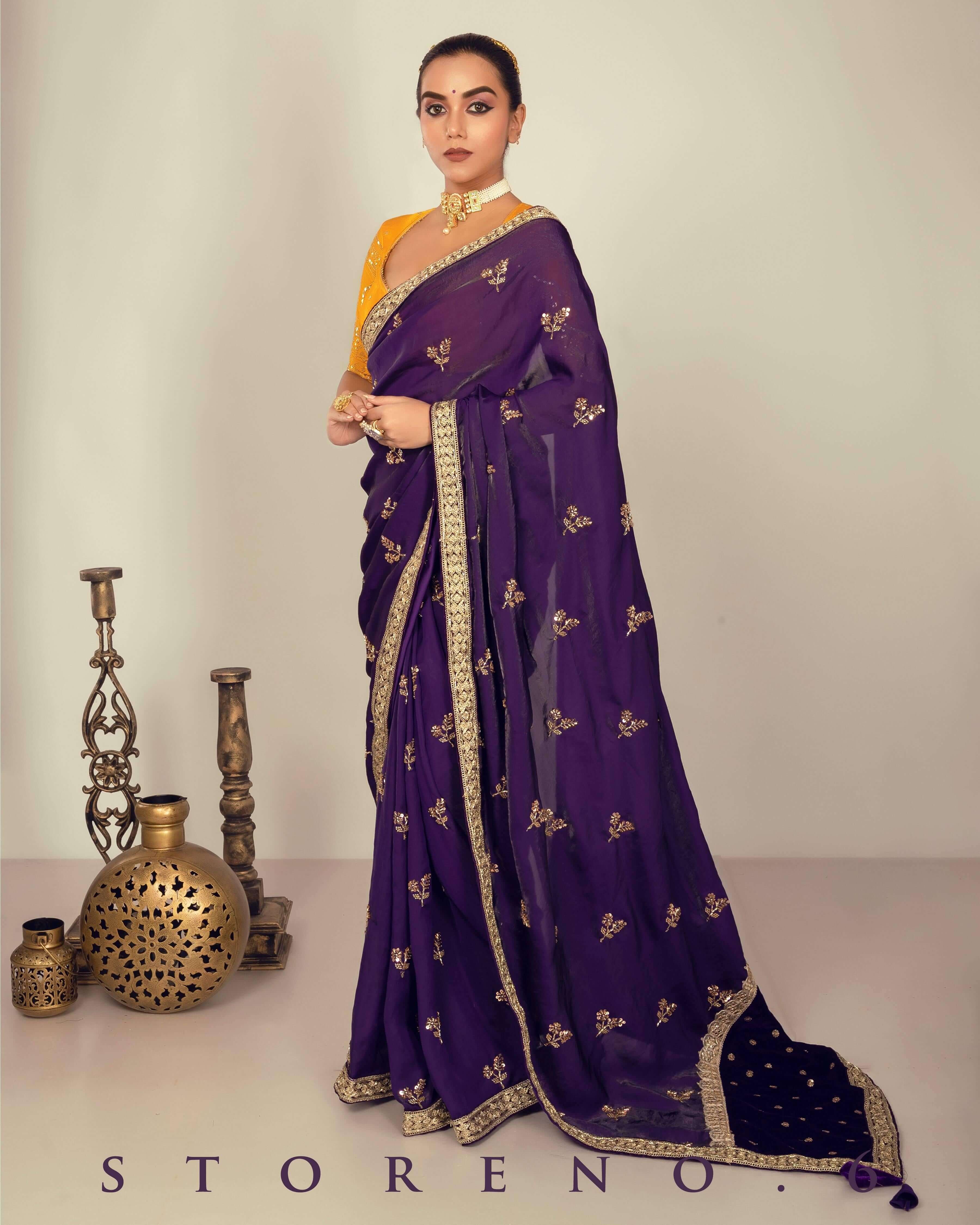 RAISIN REGALIA SAREE WITH TIMELESS TOPAZ BLOUSE.