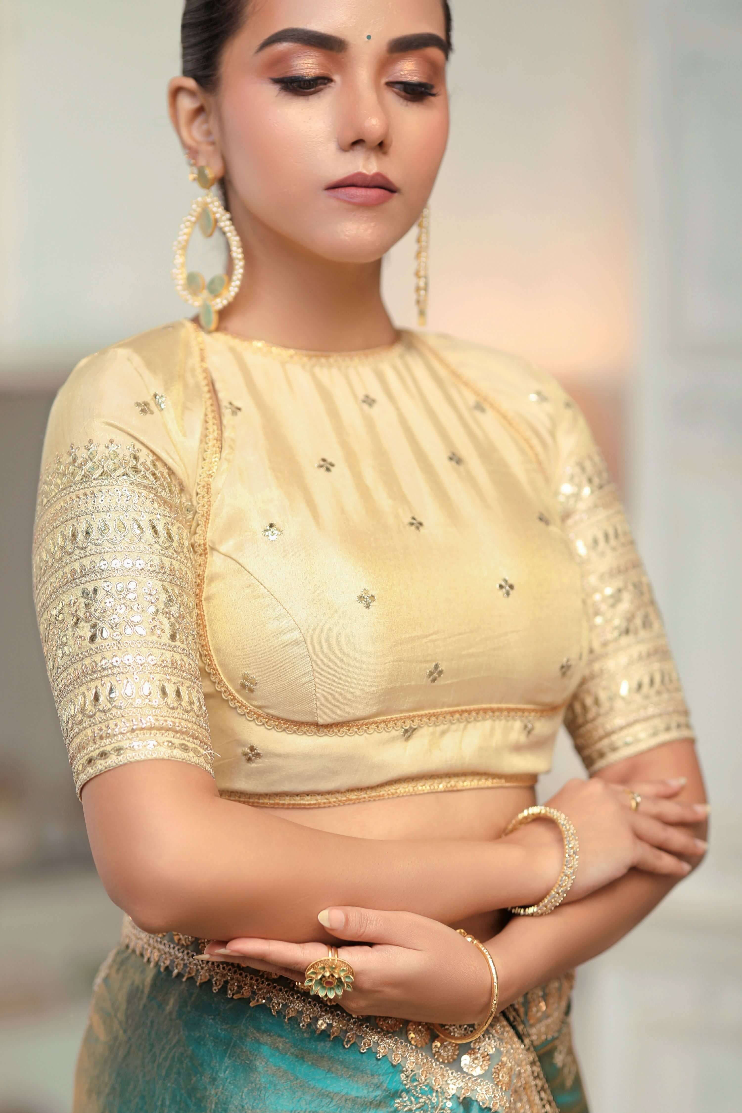 AQUA AMOUR SAREE WITH THE CLASSIC CHAMPAGNE BLOUSE