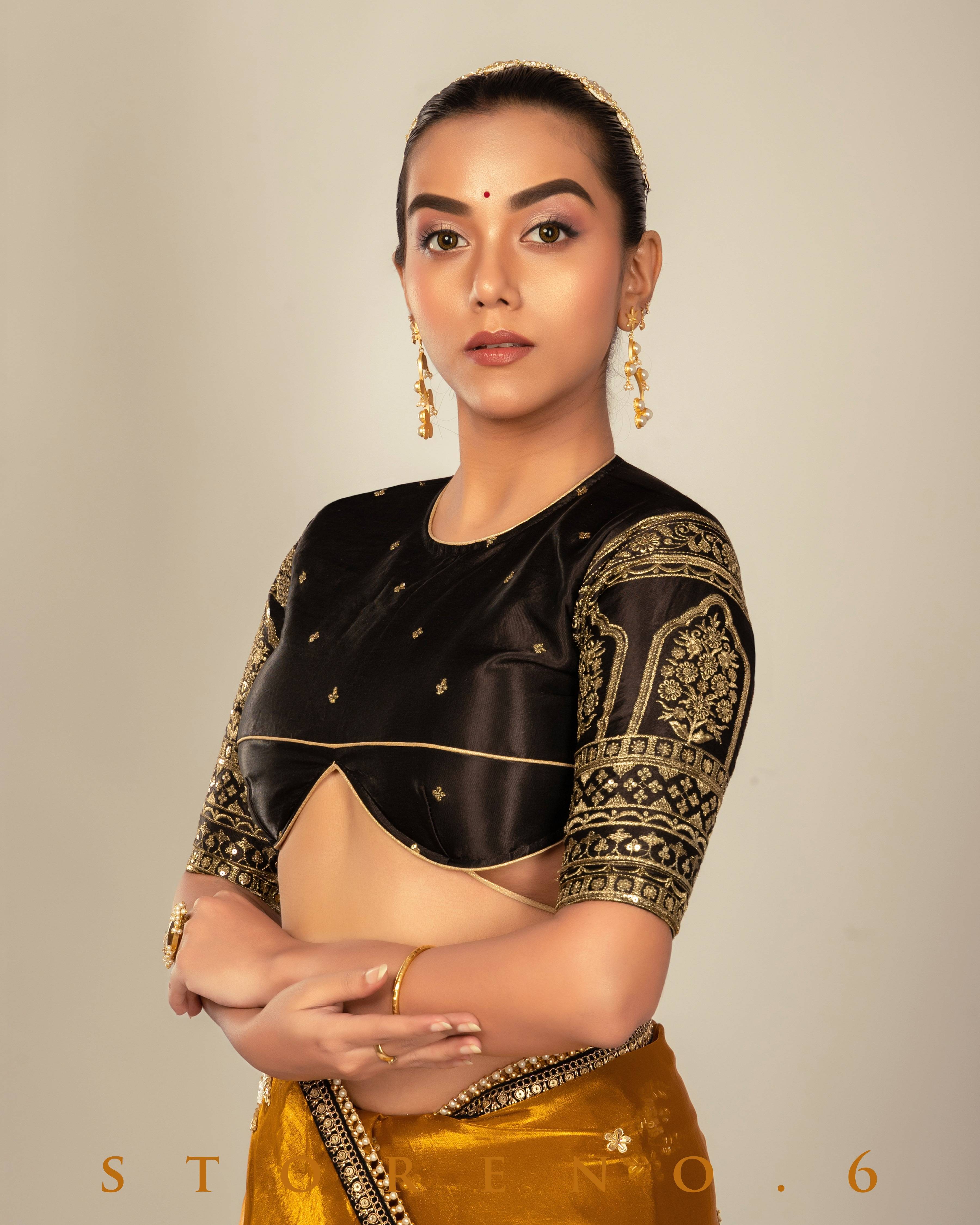 ENCHANTING EMPRESS SAREE WITH TIMELESS TITAN BLOUSE