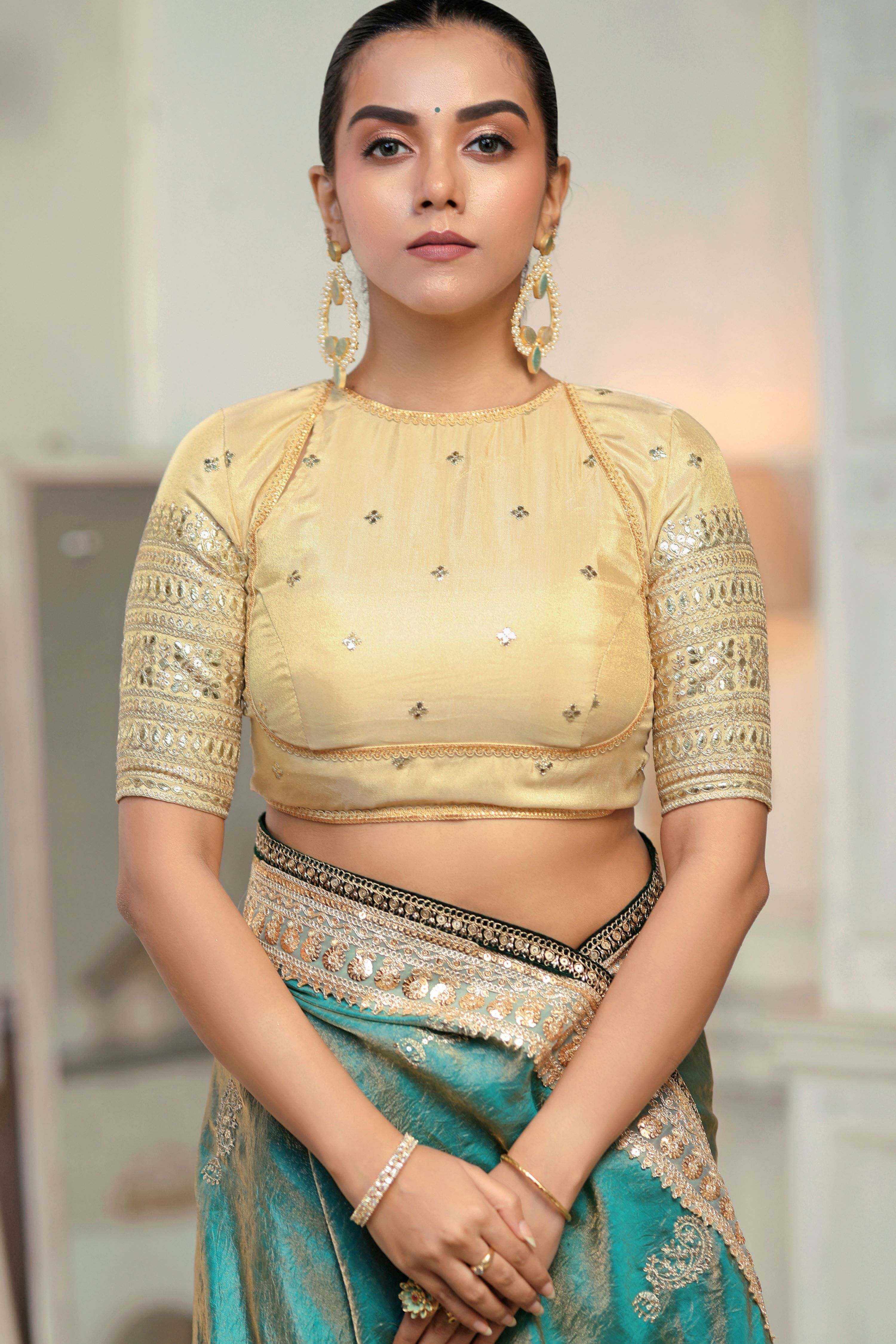 AQUA AMOUR SAREE WITH THE CLASSIC CHAMPAGNE BLOUSE