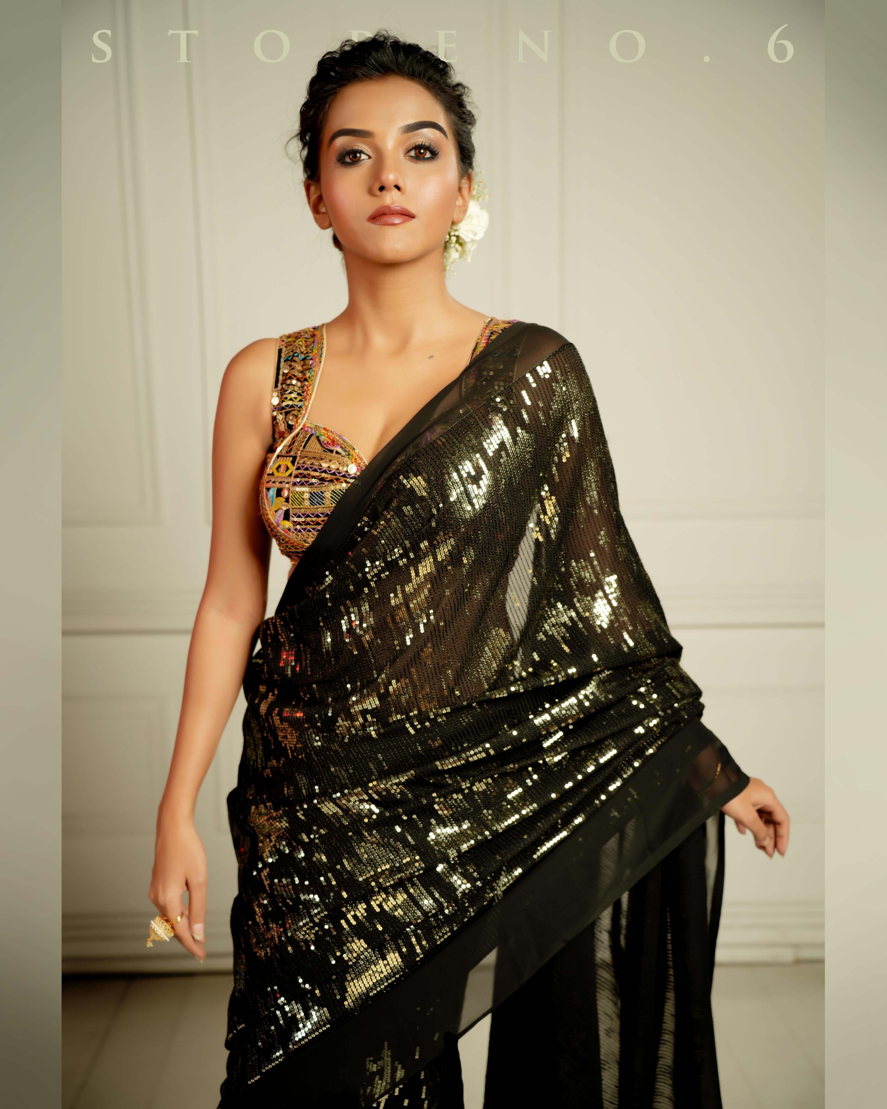 BLACK WIDOW COCKTAIL SAREE WITH SASS OF BLACK BLOUSE.
