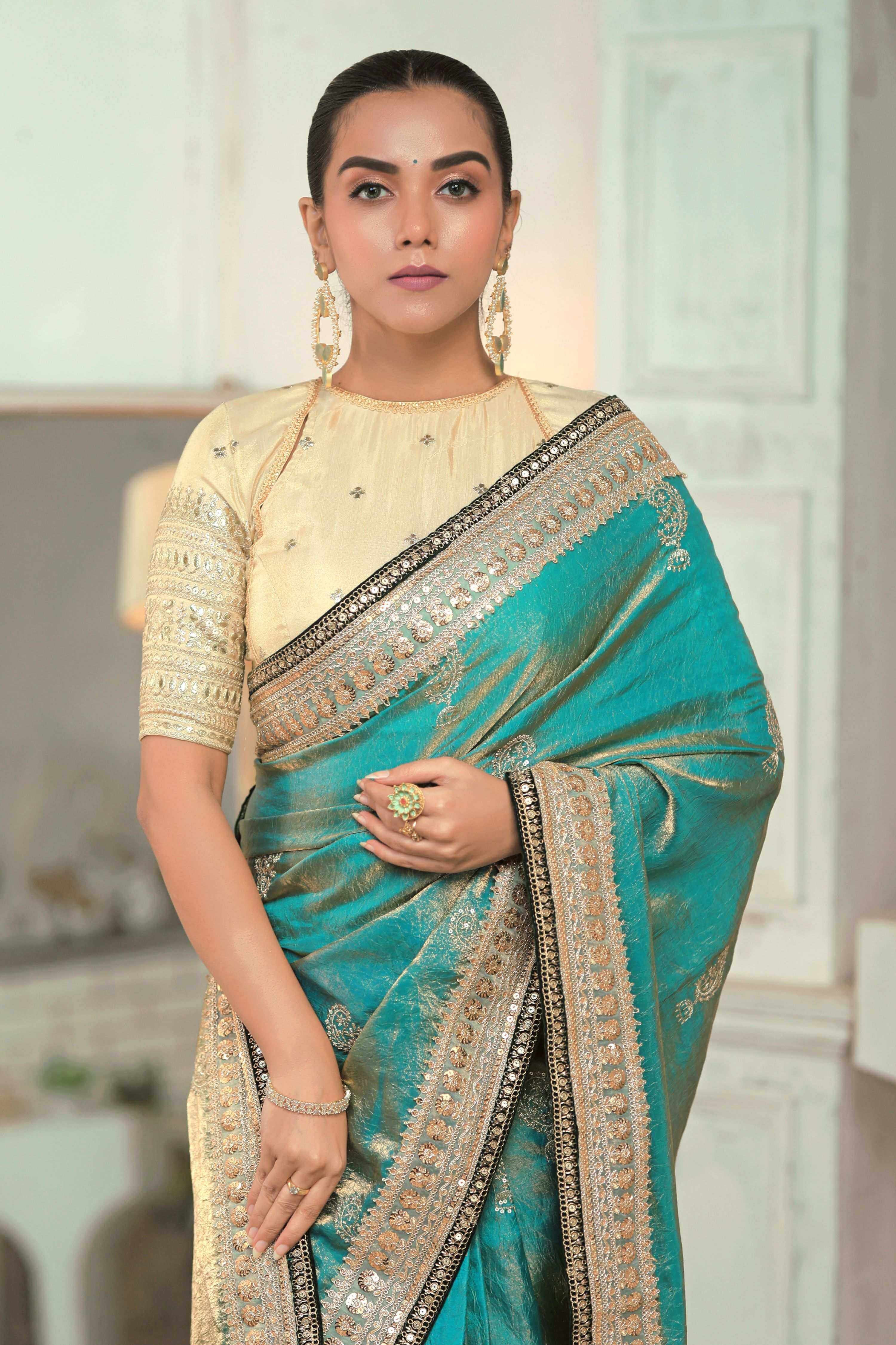 AQUA AMOUR SAREE WITH THE CLASSIC CHAMPAGNE BLOUSE