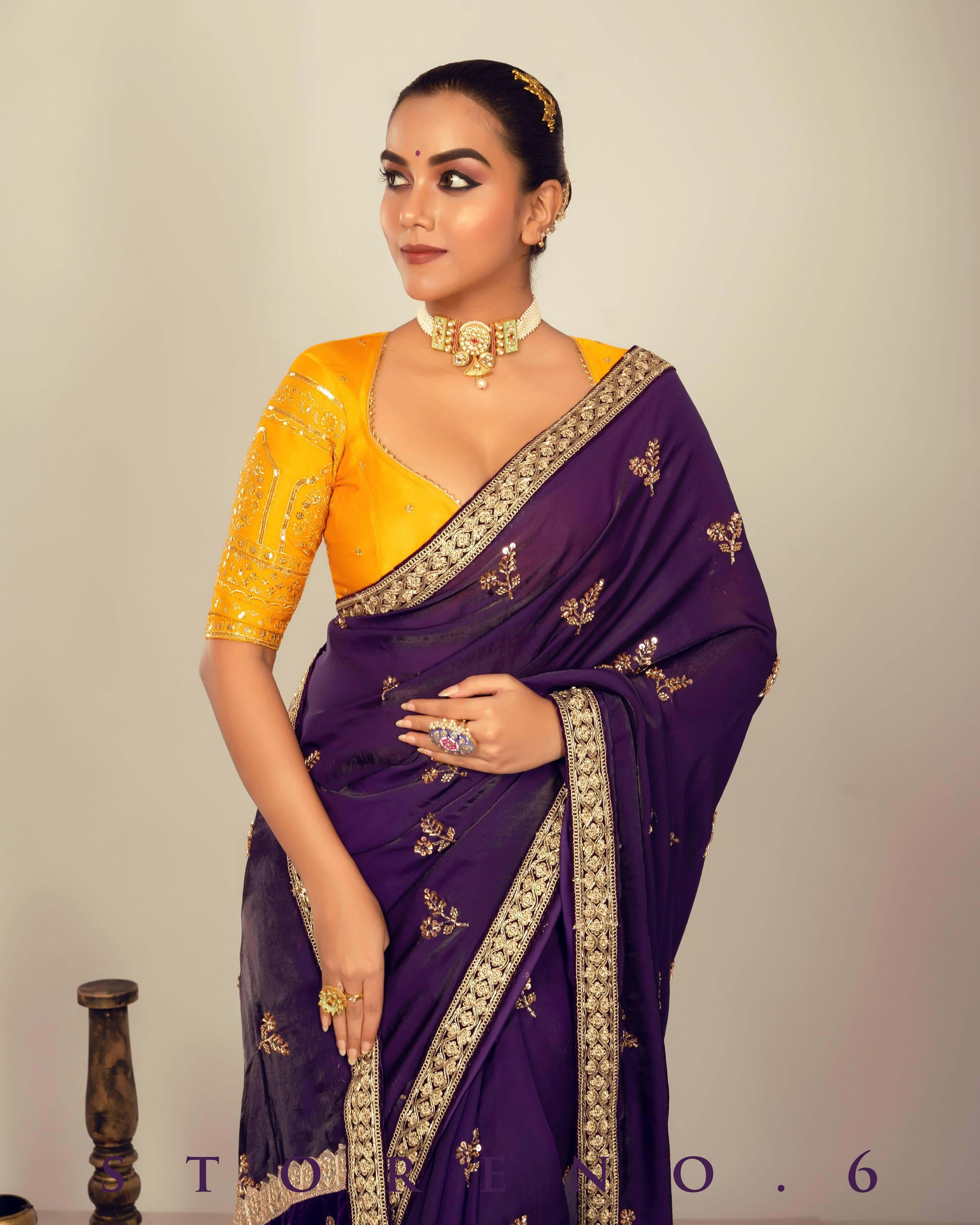 RAISIN REGALIA SAREE WITH TIMELESS TOPAZ BLOUSE.