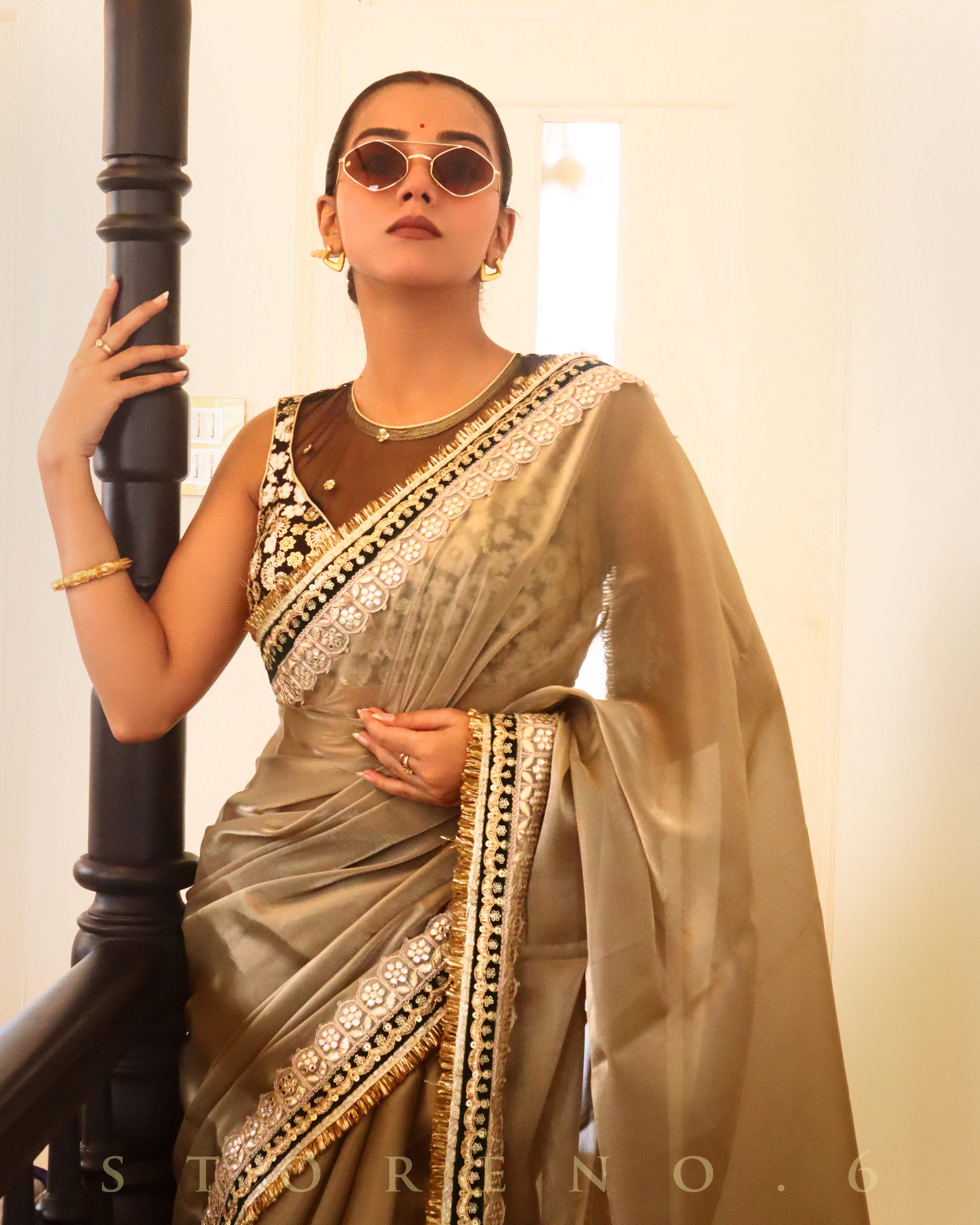 JUNE JAZZ SAREE WITH NARGIS-E-SIAH SLEEVELESS BLOUSE