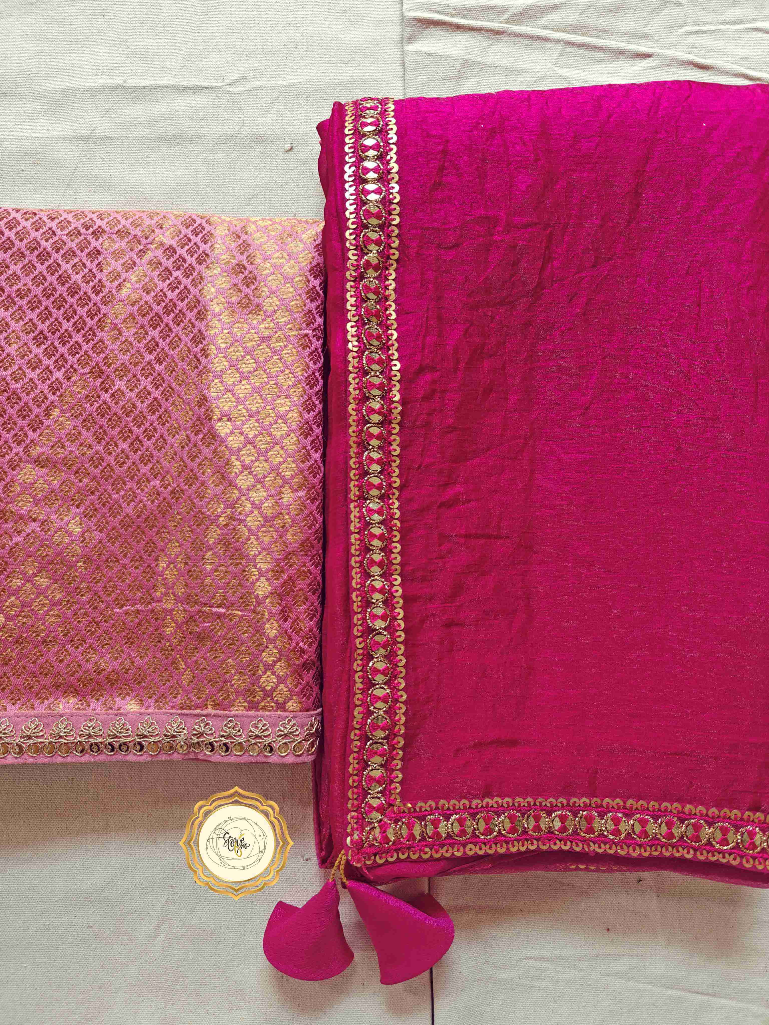 premium pink saree with unstitched blouse featuring pink butter tissue and lace detailing.