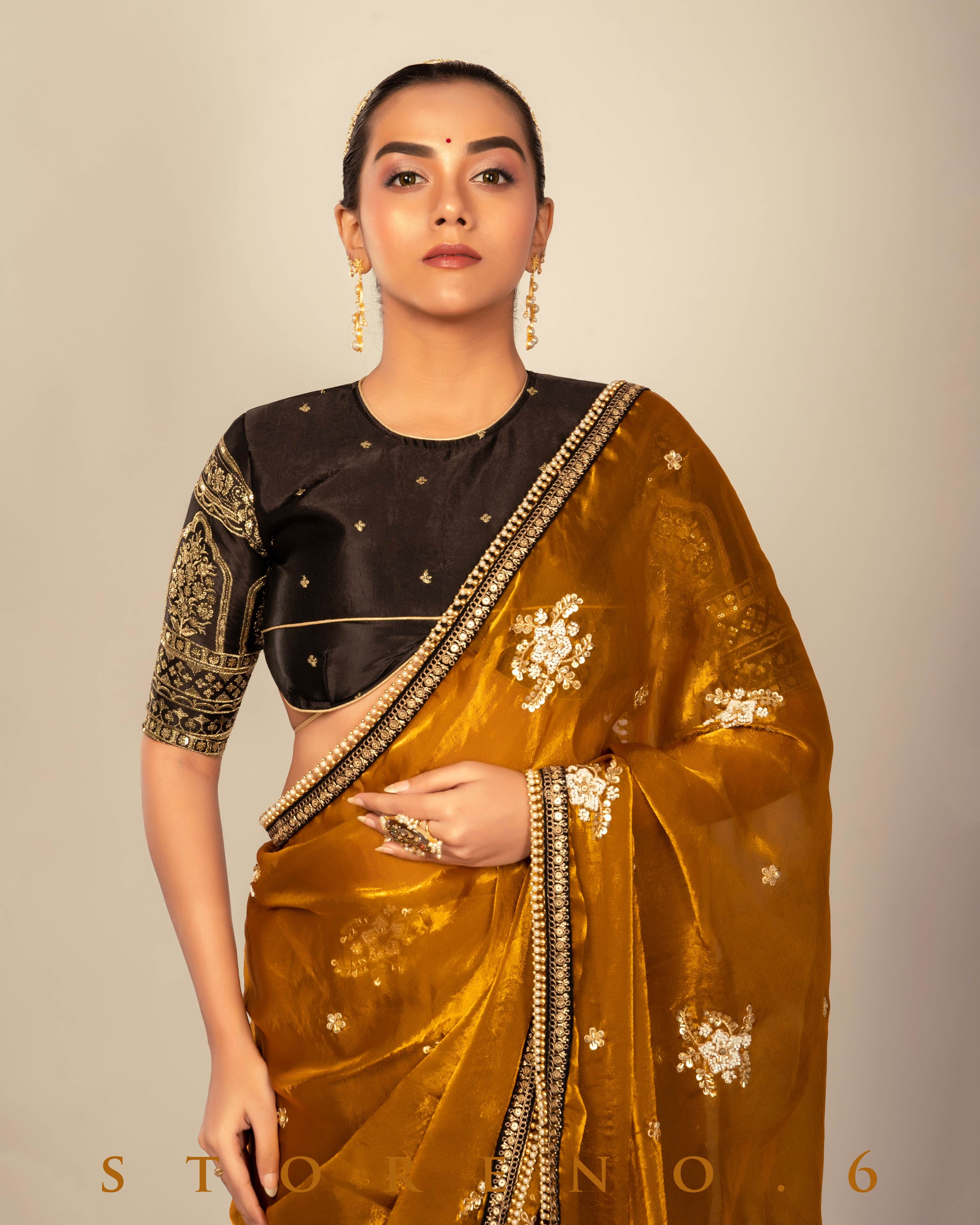 ENCHANTING EMPRESS SAREE WITH TIMELESS TITAN BLOUSE