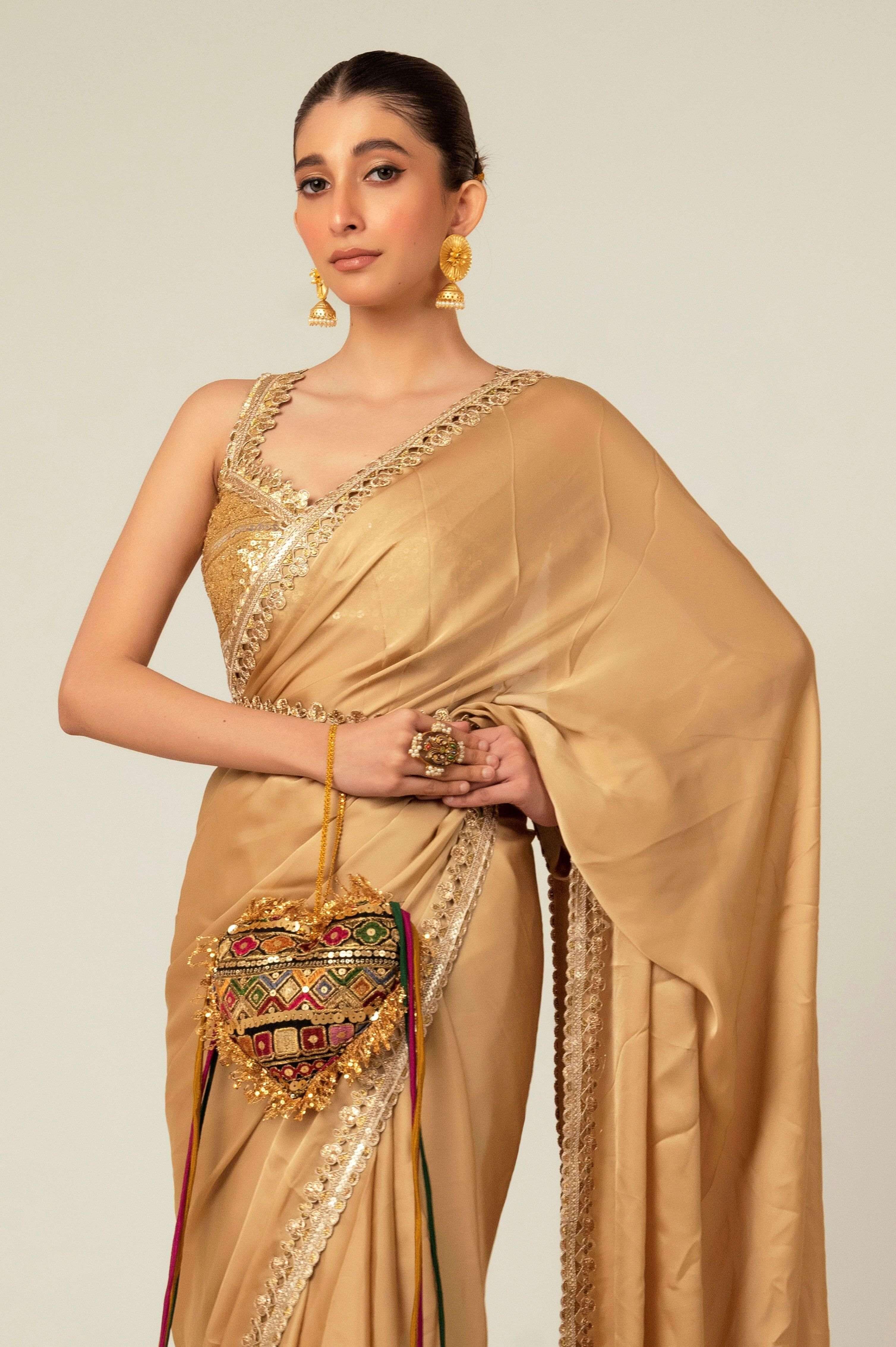 SEQUIN SPARK SAREE WITH LIME LIGHT BLOUSE.