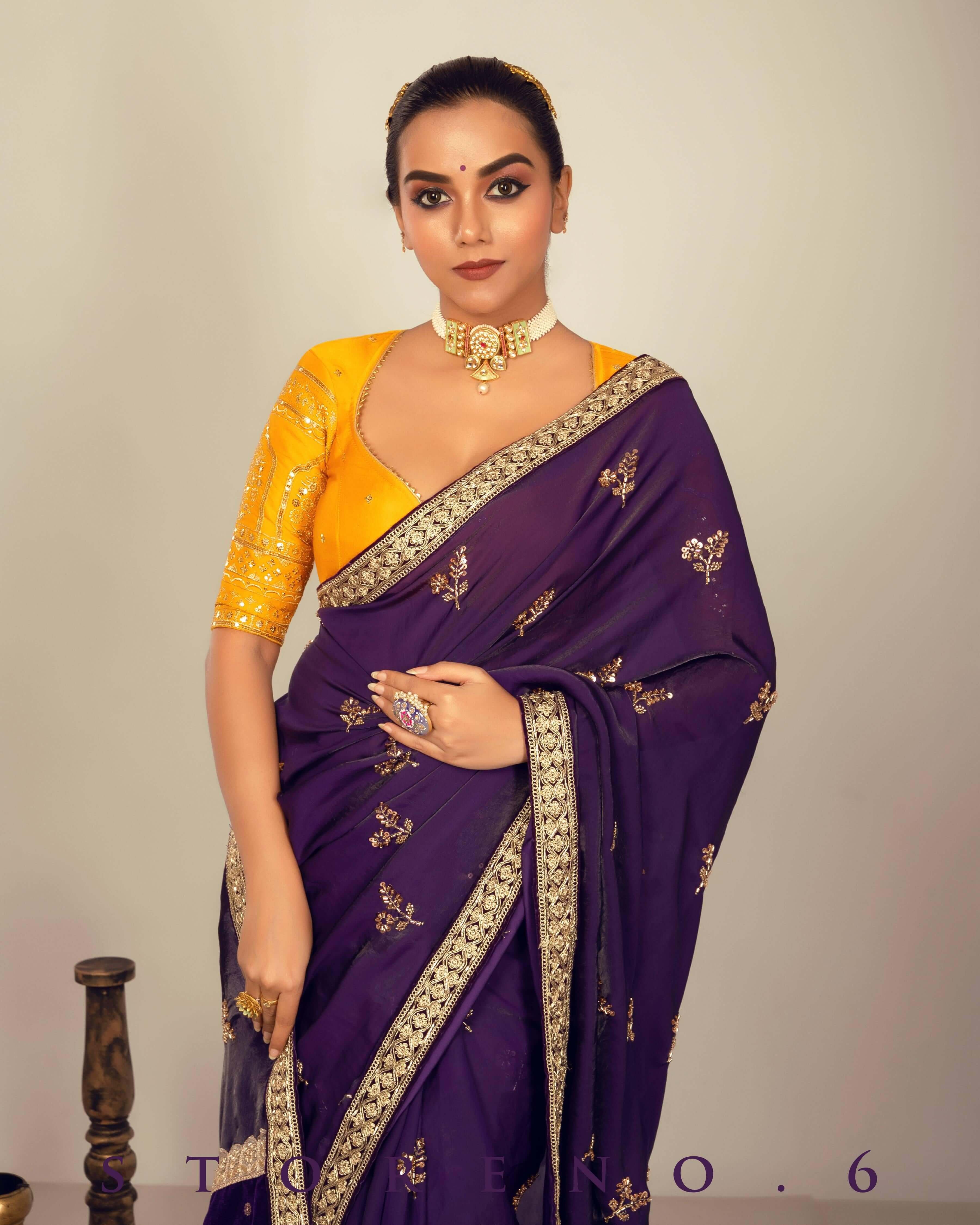 RAISIN REGALIA SAREE WITH TIMELESS TOPAZ BLOUSE.