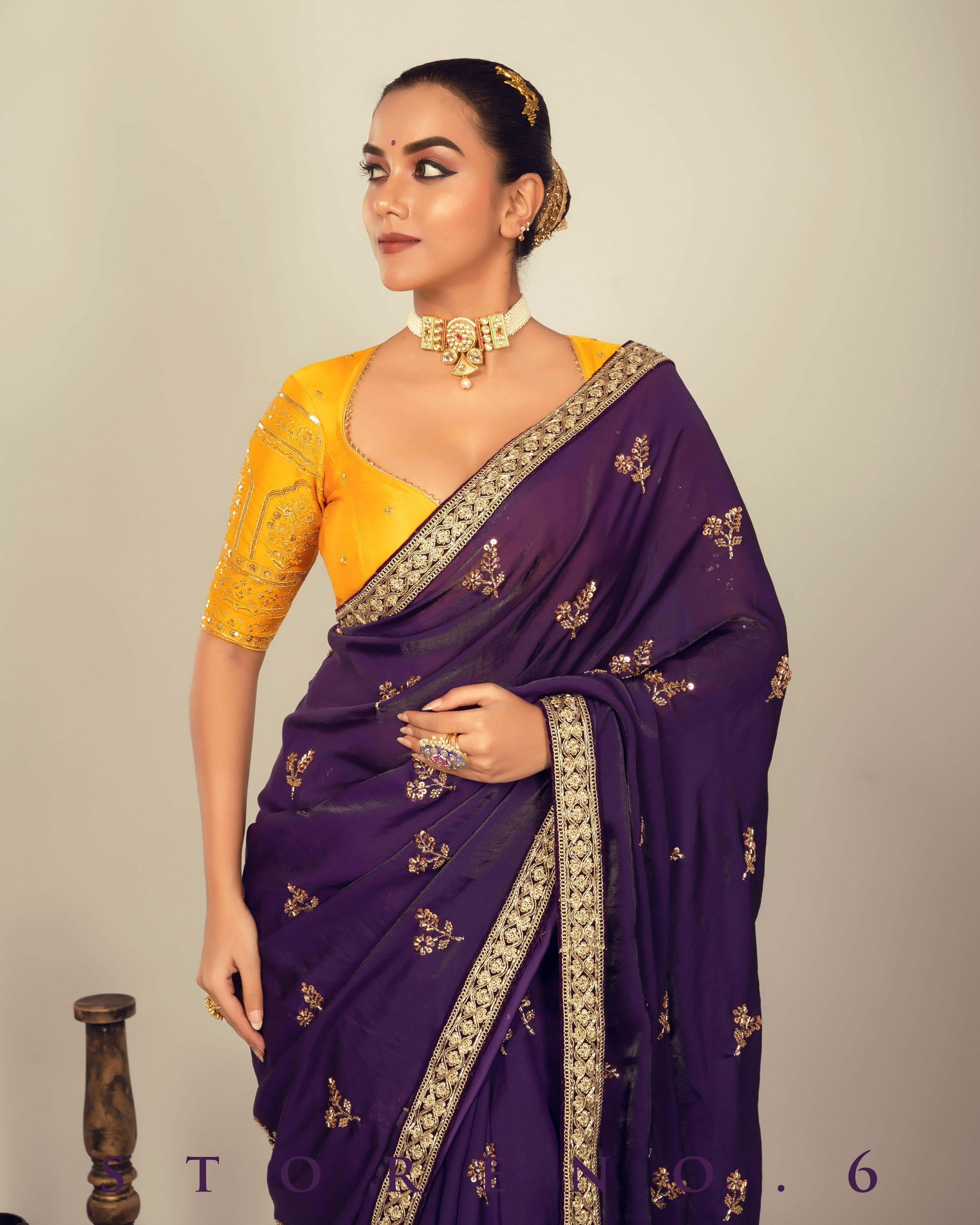RAISIN REGALIA SAREE WITH TIMELESS TOPAZ BLOUSE.