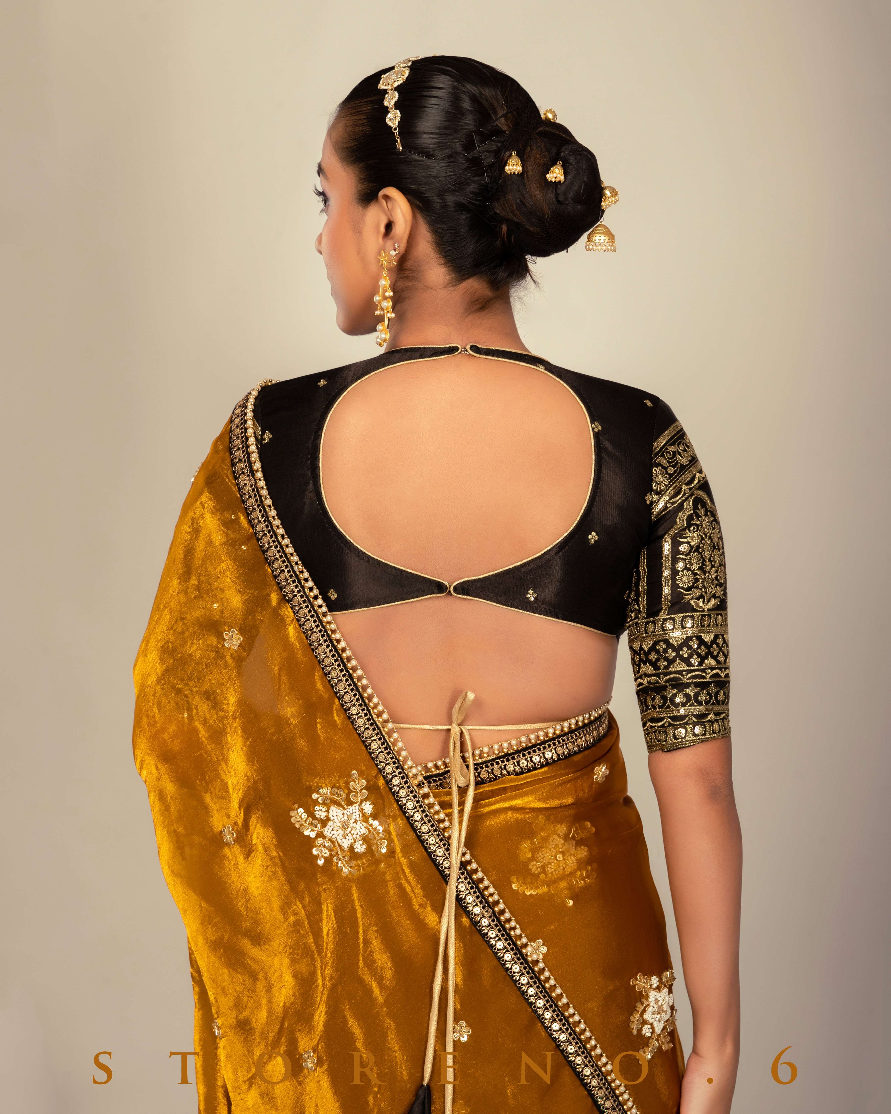 ENCHANTING EMPRESS SAREE WITH TIMELESS TITAN BLOUSE