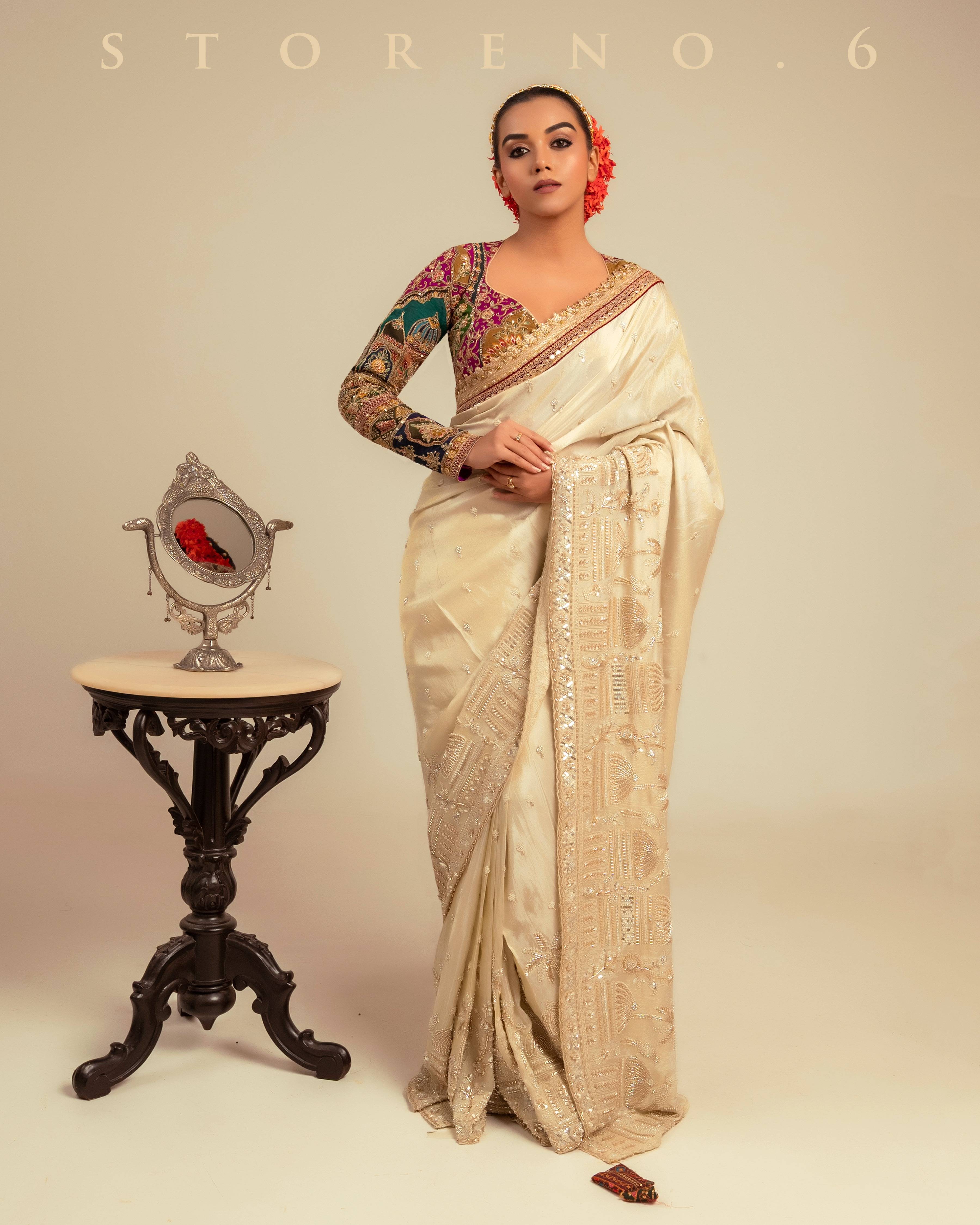 IVORY INSIGHT SAREE WITH COUTURE CHARM BLOUSE