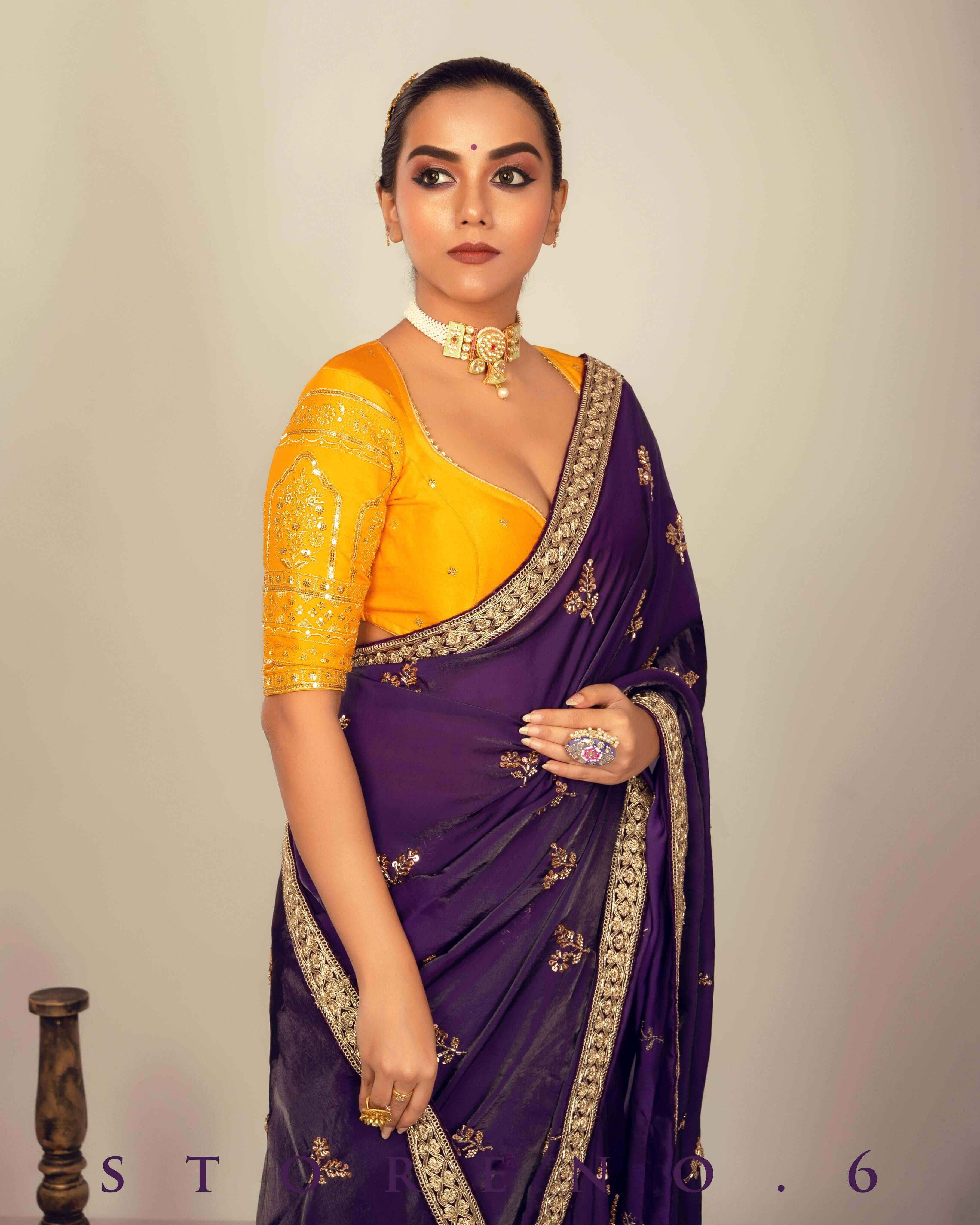 RAISIN REGALIA SAREE WITH TIMELESS TOPAZ BLOUSE.