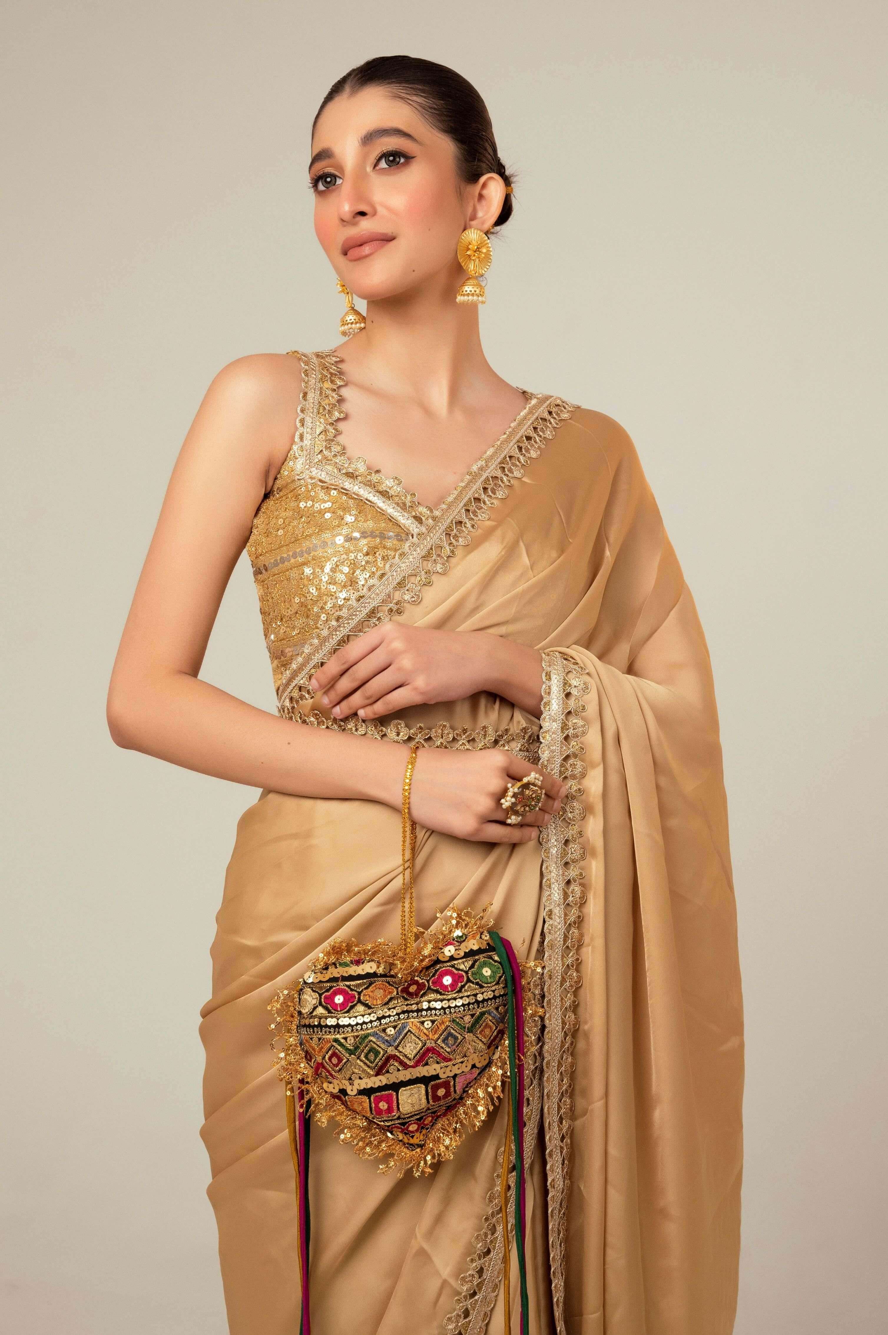 SEQUIN SPARK SAREE WITH LIME LIGHT BLOUSE.