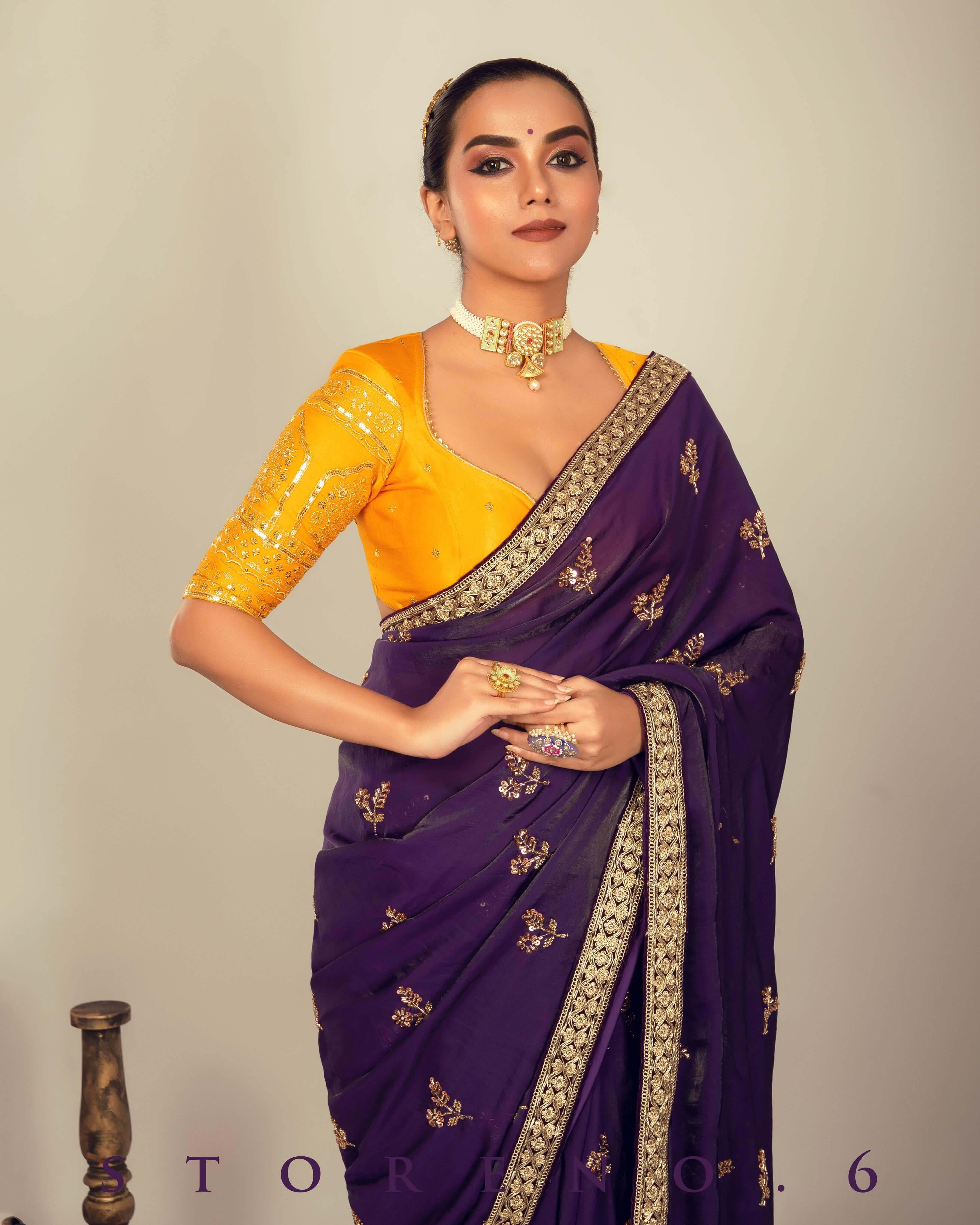 RAISIN REGALIA SAREE WITH TIMELESS TOPAZ BLOUSE.