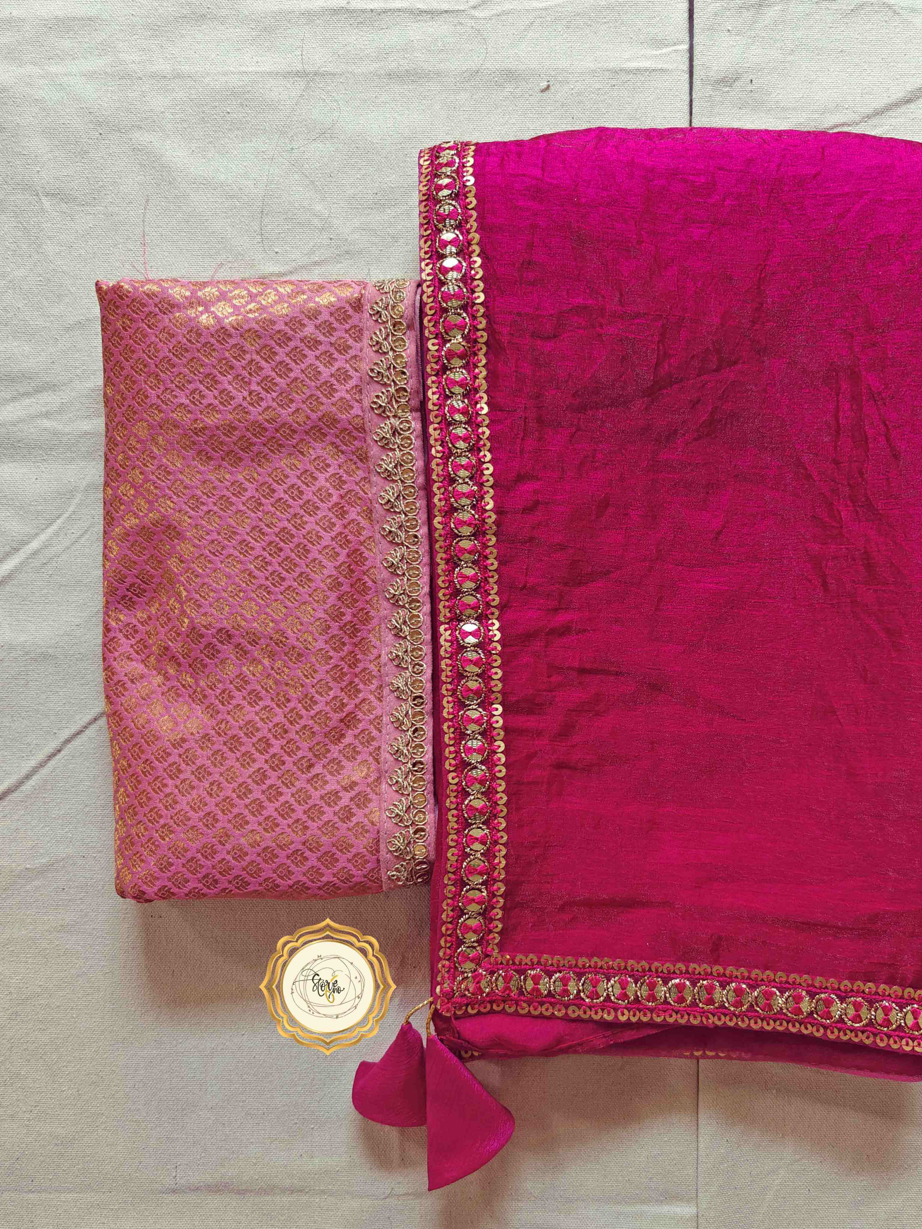 premium pink saree with unstitched blouse featuring pink brocade and tassels