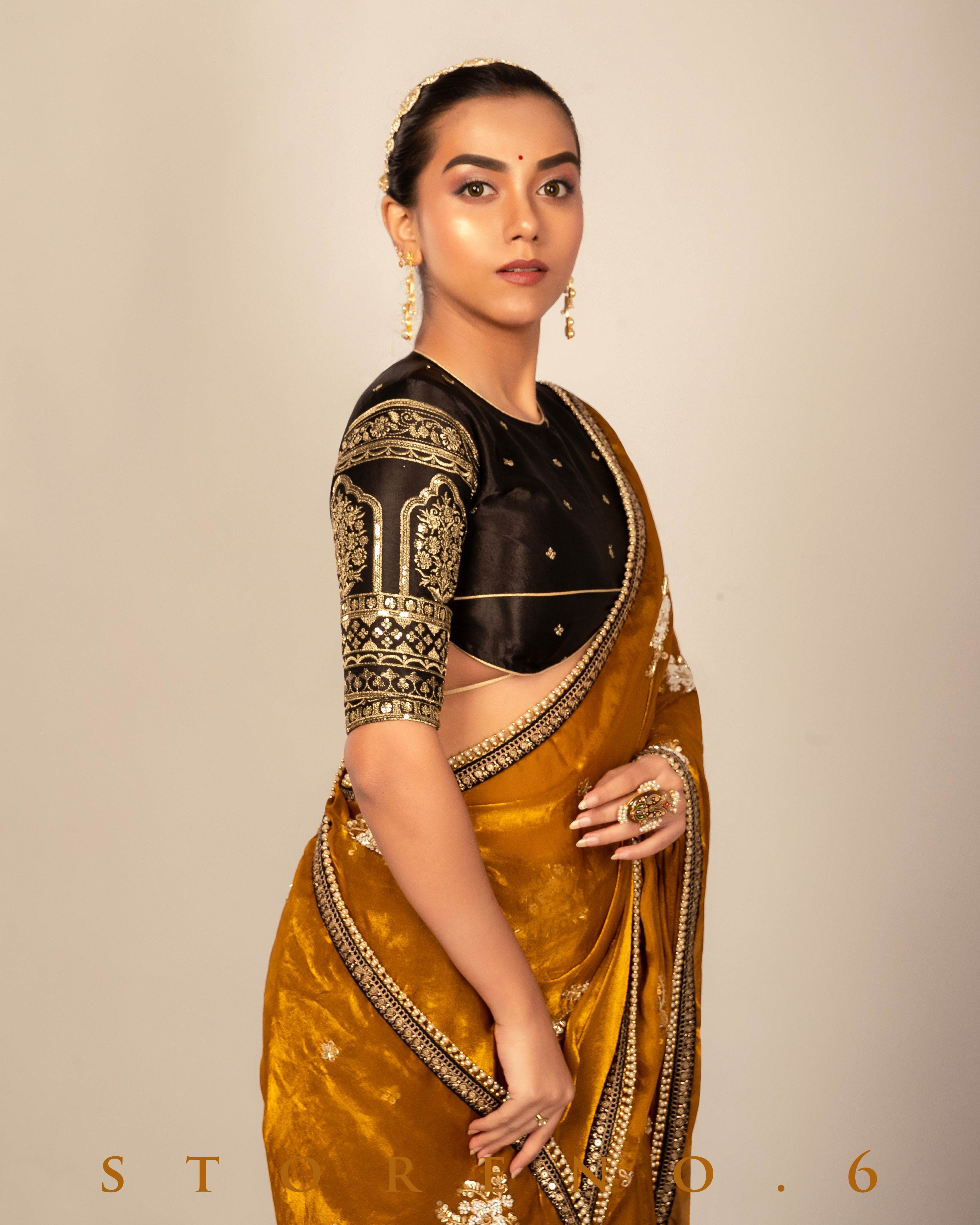 ENCHANTING EMPRESS SAREE WITH TIMELESS TITAN BLOUSE