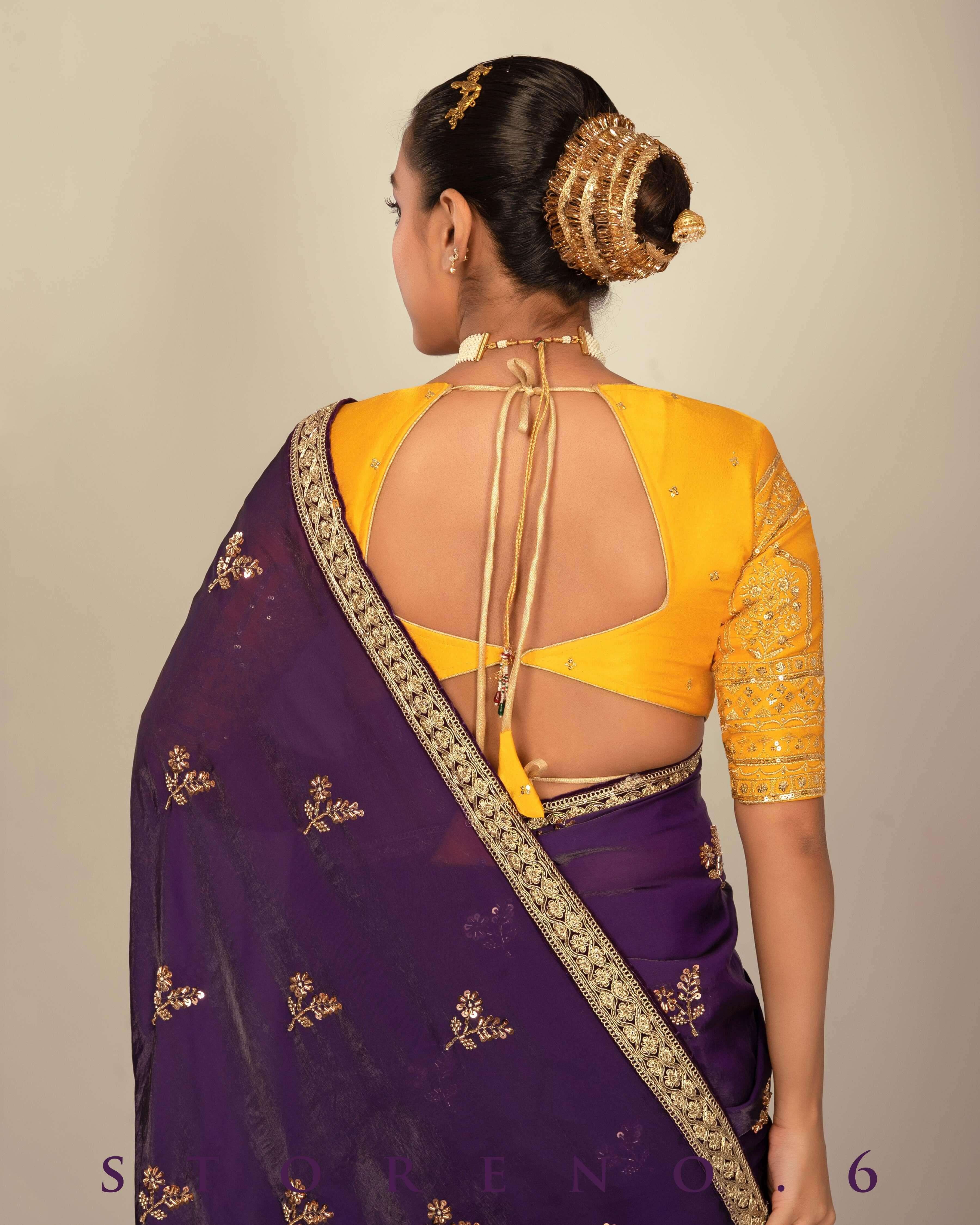 RAISIN REGALIA SAREE WITH TIMELESS TOPAZ BLOUSE.