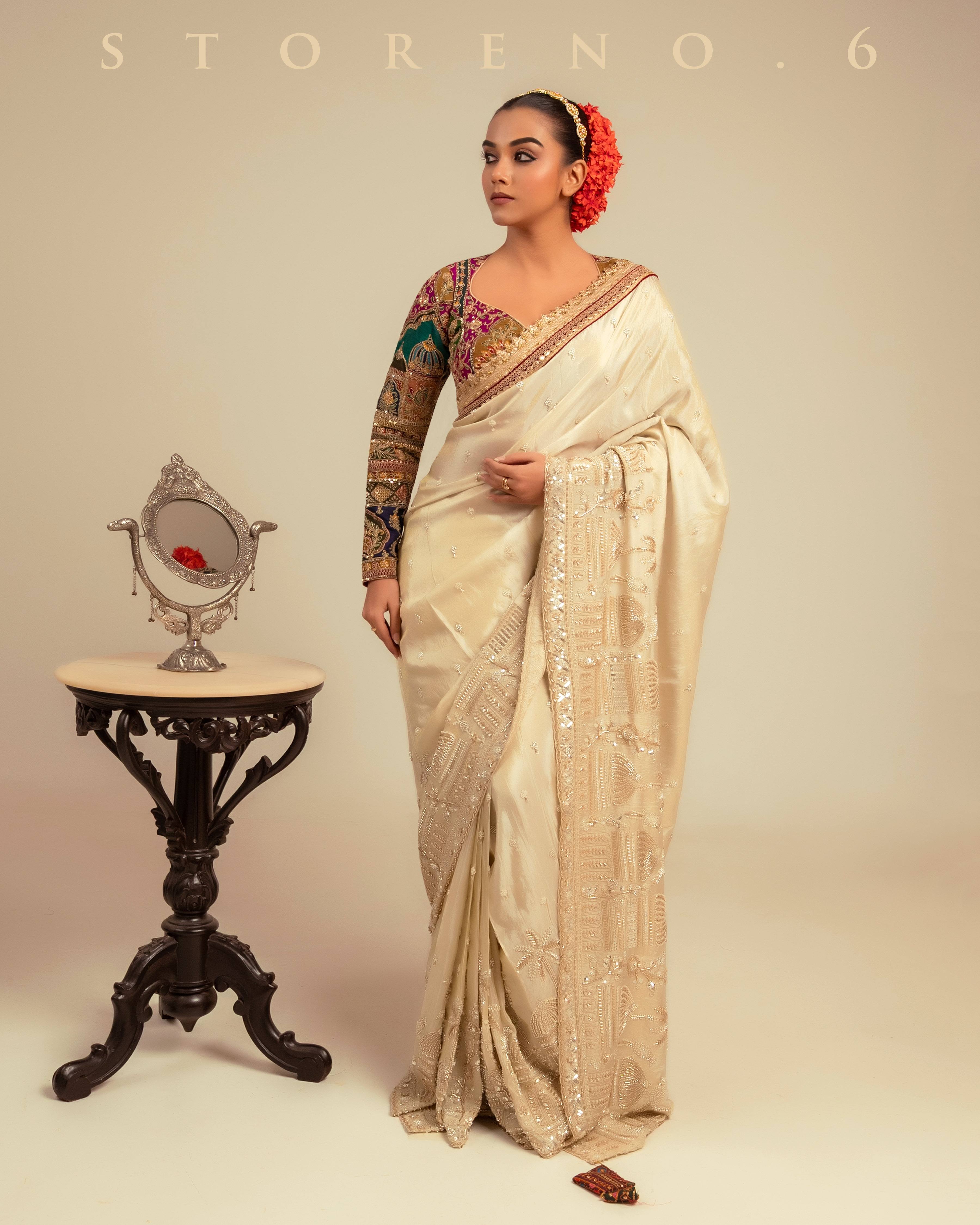 IVORY INSIGHT SAREE WITH COUTURE CHARM BLOUSE