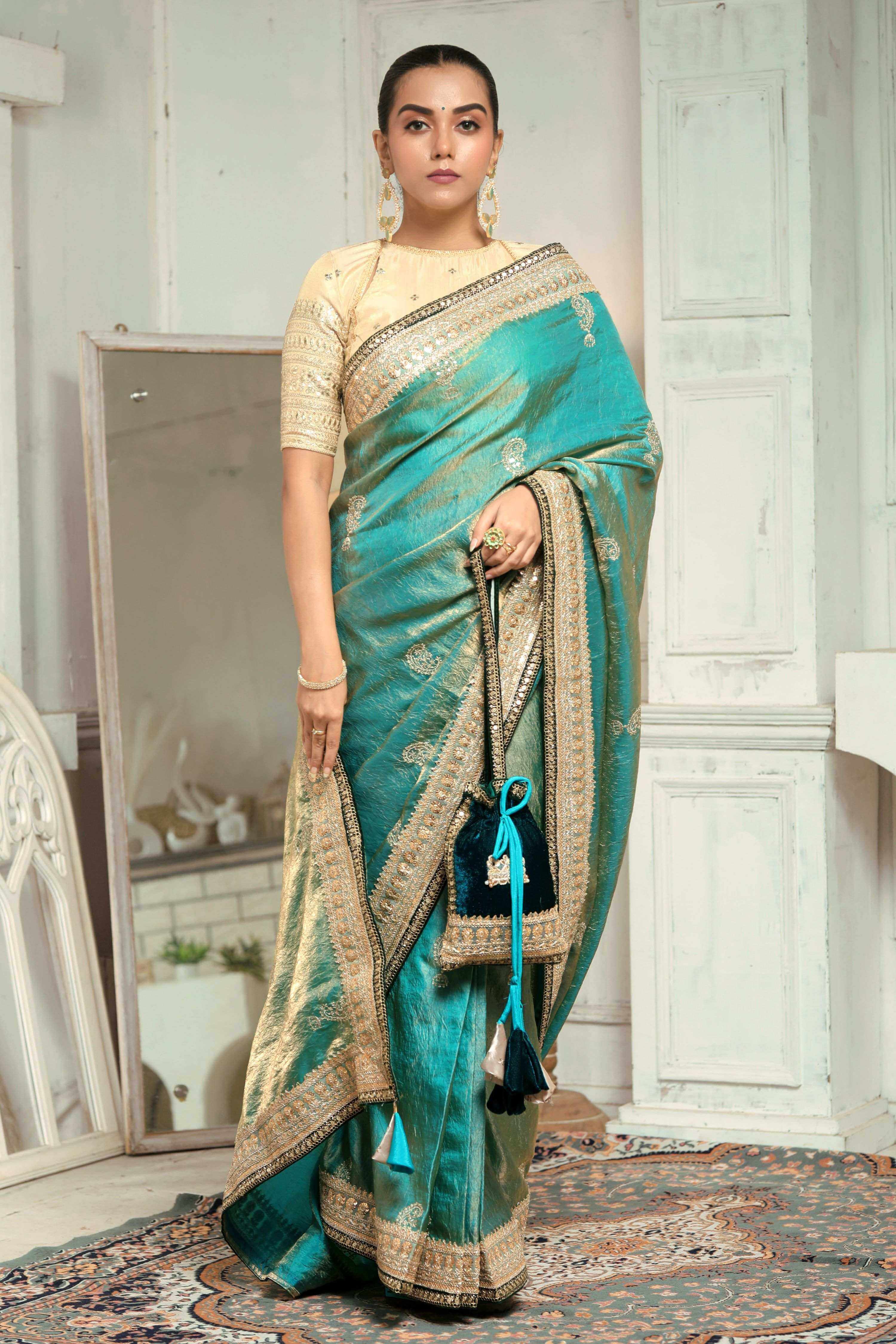 AQUA AMOUR SAREE WITH THE CLASSIC CHAMPAGNE BLOUSE