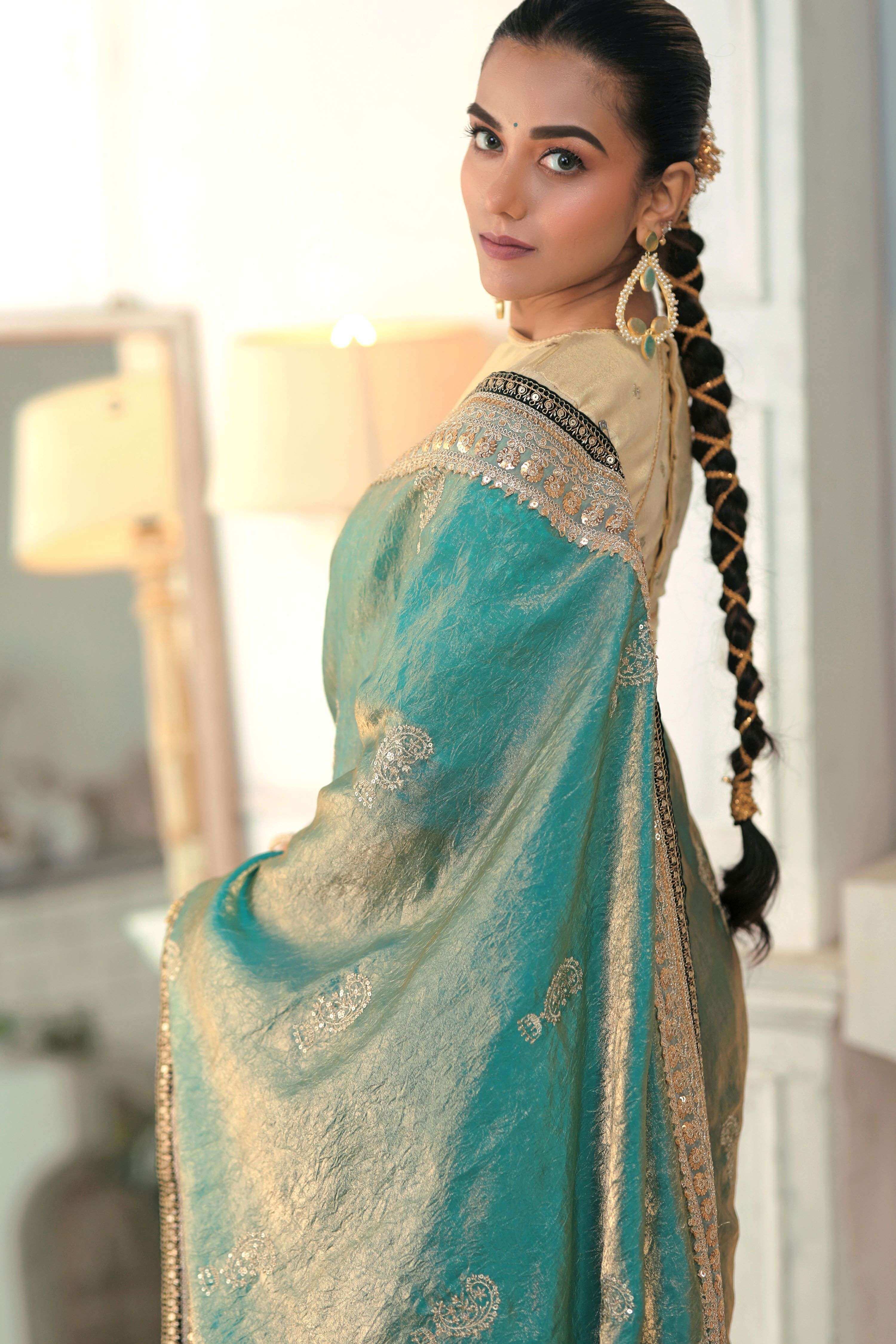 AQUA AMOUR SAREE WITH THE CLASSIC CHAMPAGNE BLOUSE