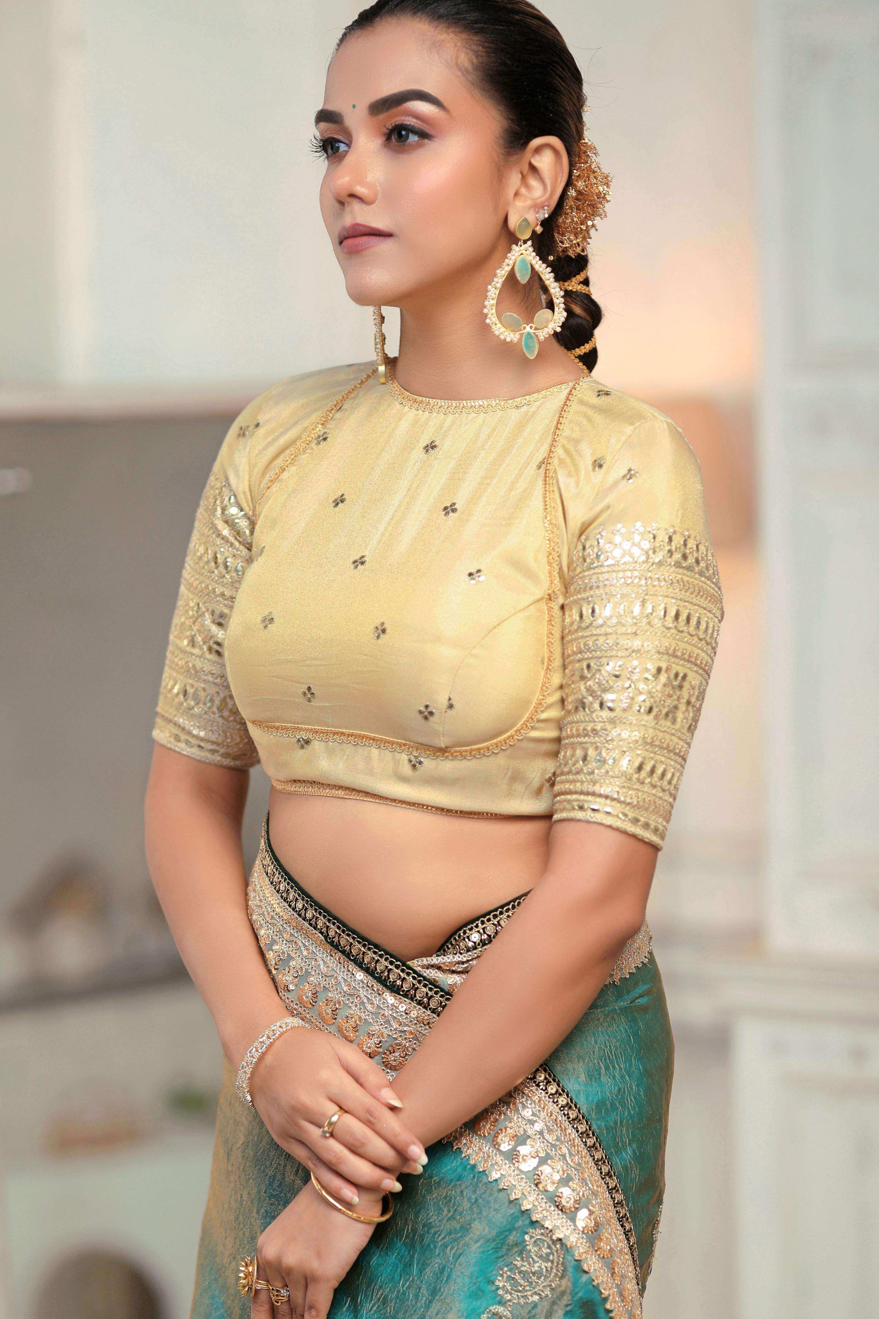 AQUA AMOUR SAREE WITH THE CLASSIC CHAMPAGNE BLOUSE